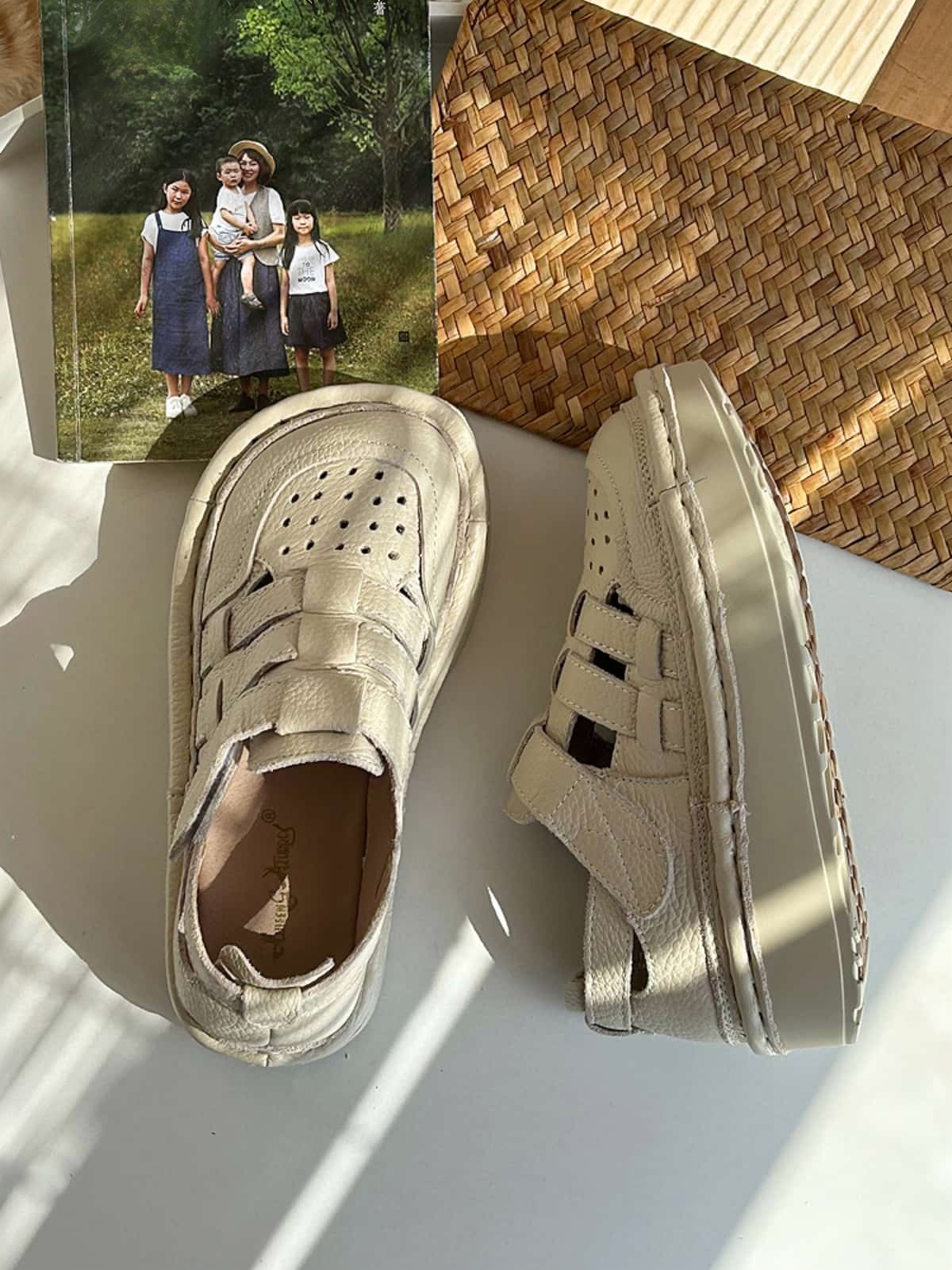 Leather summer new Roman women's shoes perforated hollow breathable thick-soled big head shoes bag head sandals women