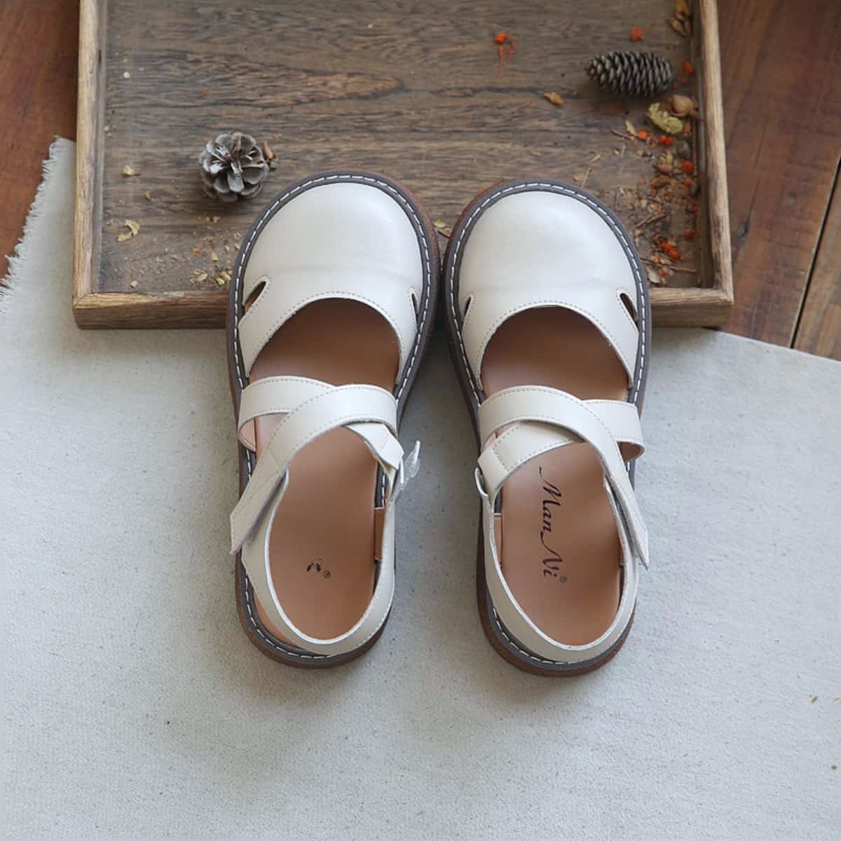 Leather hollow bag head platform big head shoes summer cross strap middle heel Roman sandals