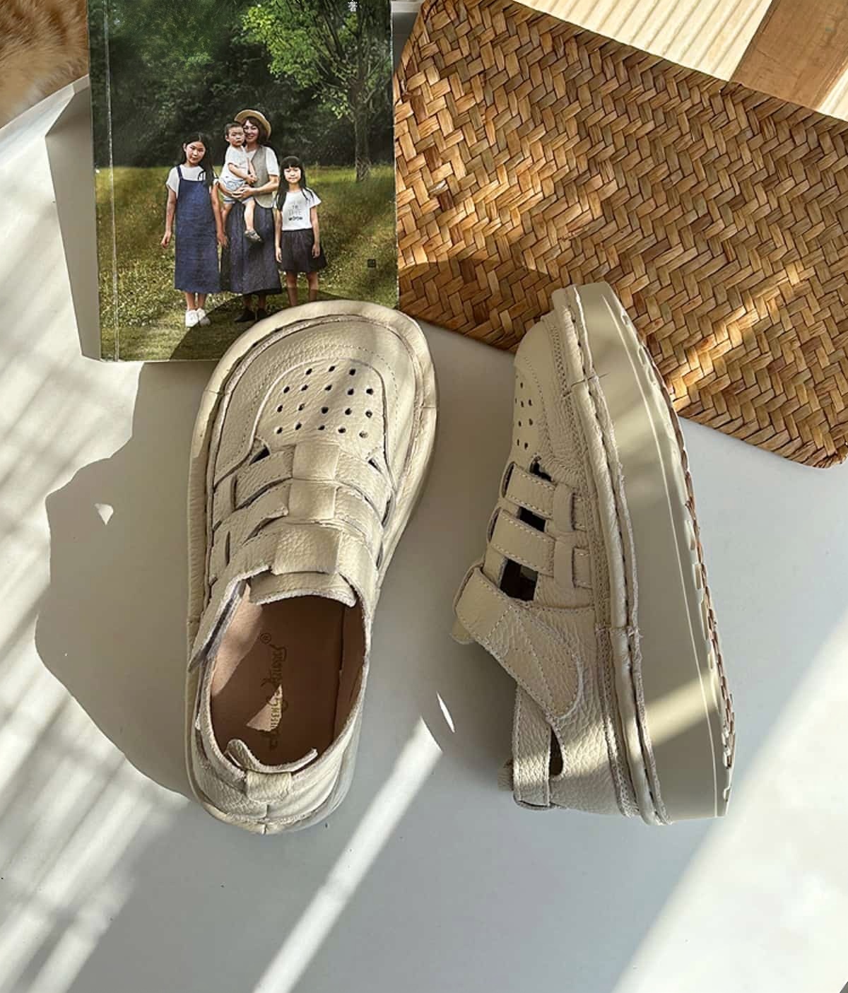 Leather summer new Roman women's shoes perforated hollow breathable thick-soled big head shoes bag head sandals women