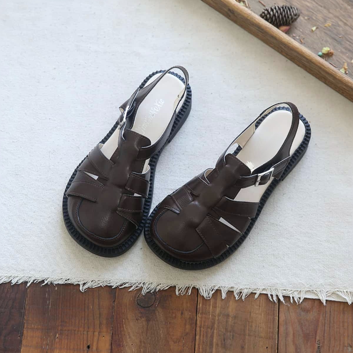 Glossy hollow bag head flats summer college style versatile big head shoes Roman sandals women