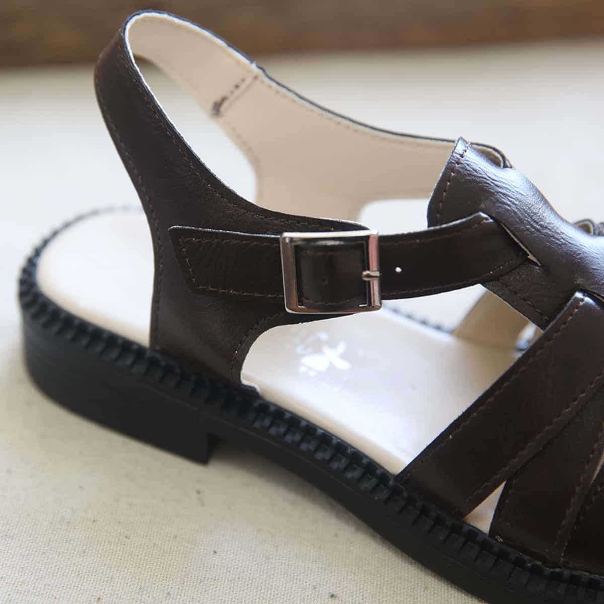 Glossy hollow bag head flats summer college style versatile big head shoes Roman sandals women