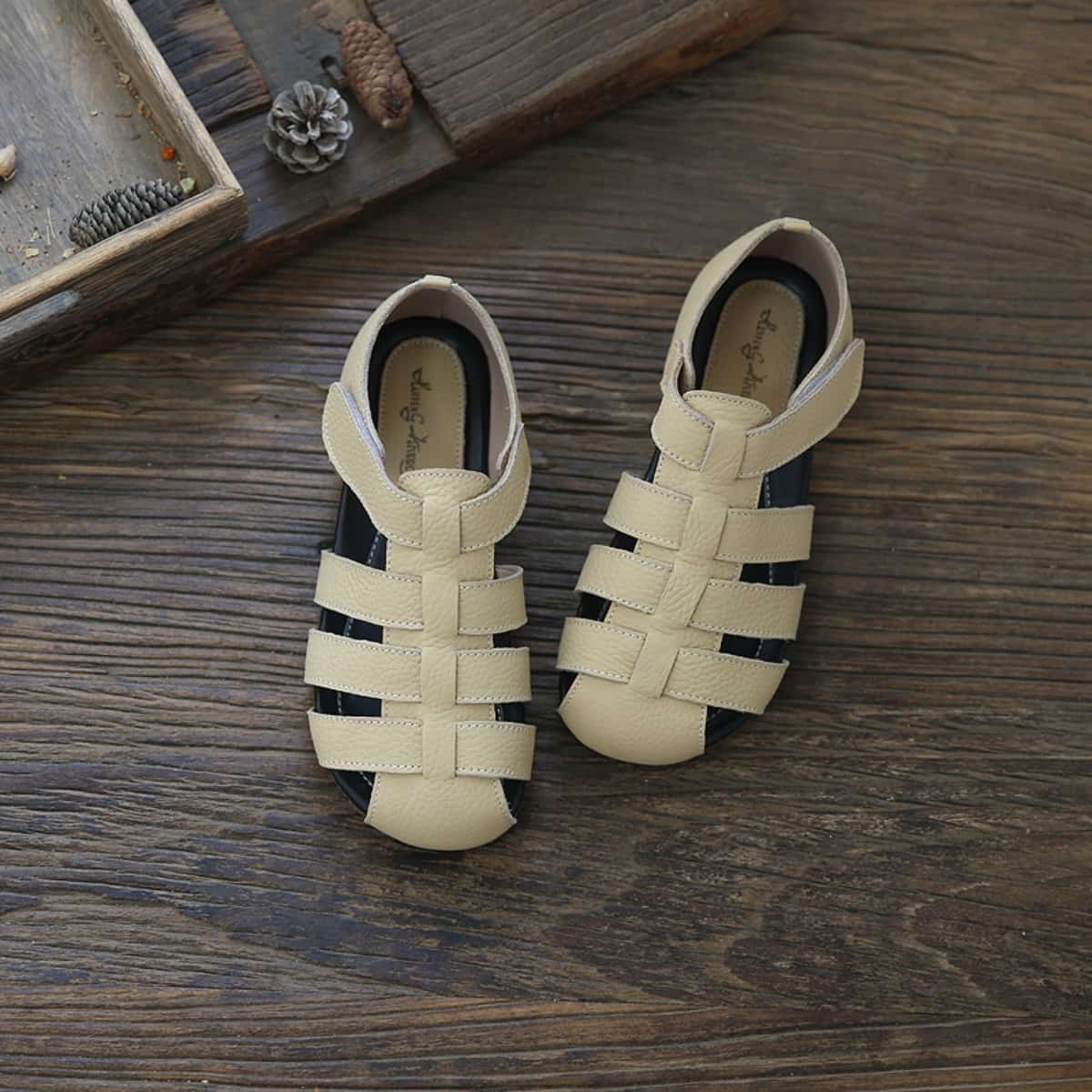 Leather hollowed-out bag head flats summer comfortable soft-soled Roman sandals