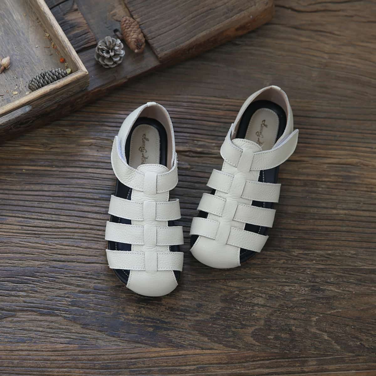 Leather hollowed-out bag head flats summer comfortable soft-soled Roman sandals