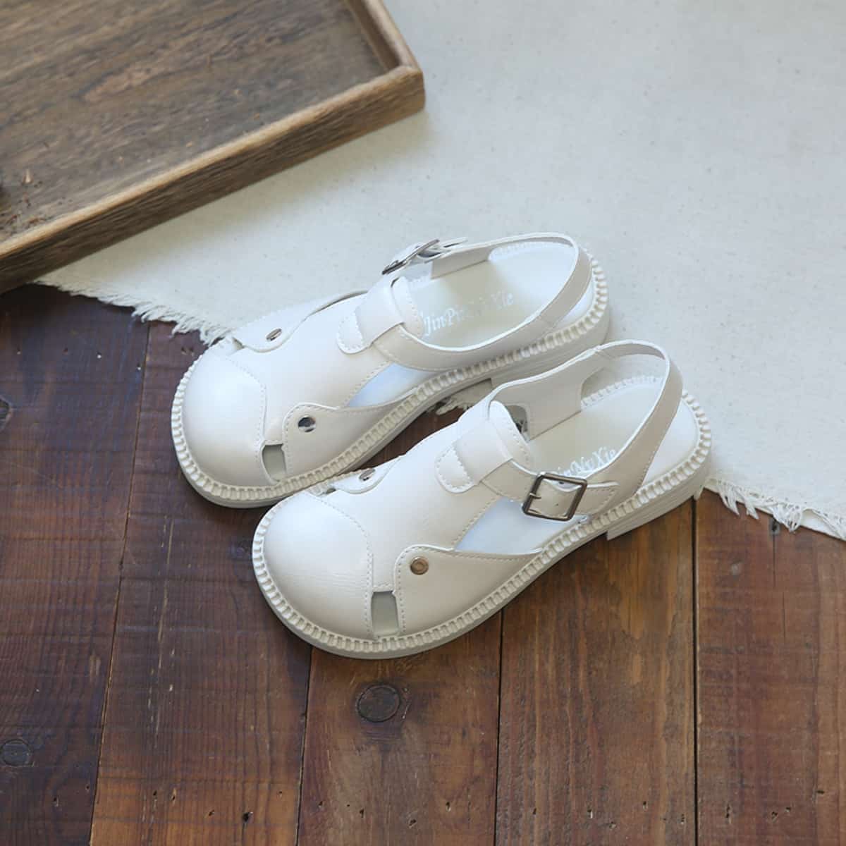 Hollow round head low heel Roman shoes summer new rivet fashion T-button sandals