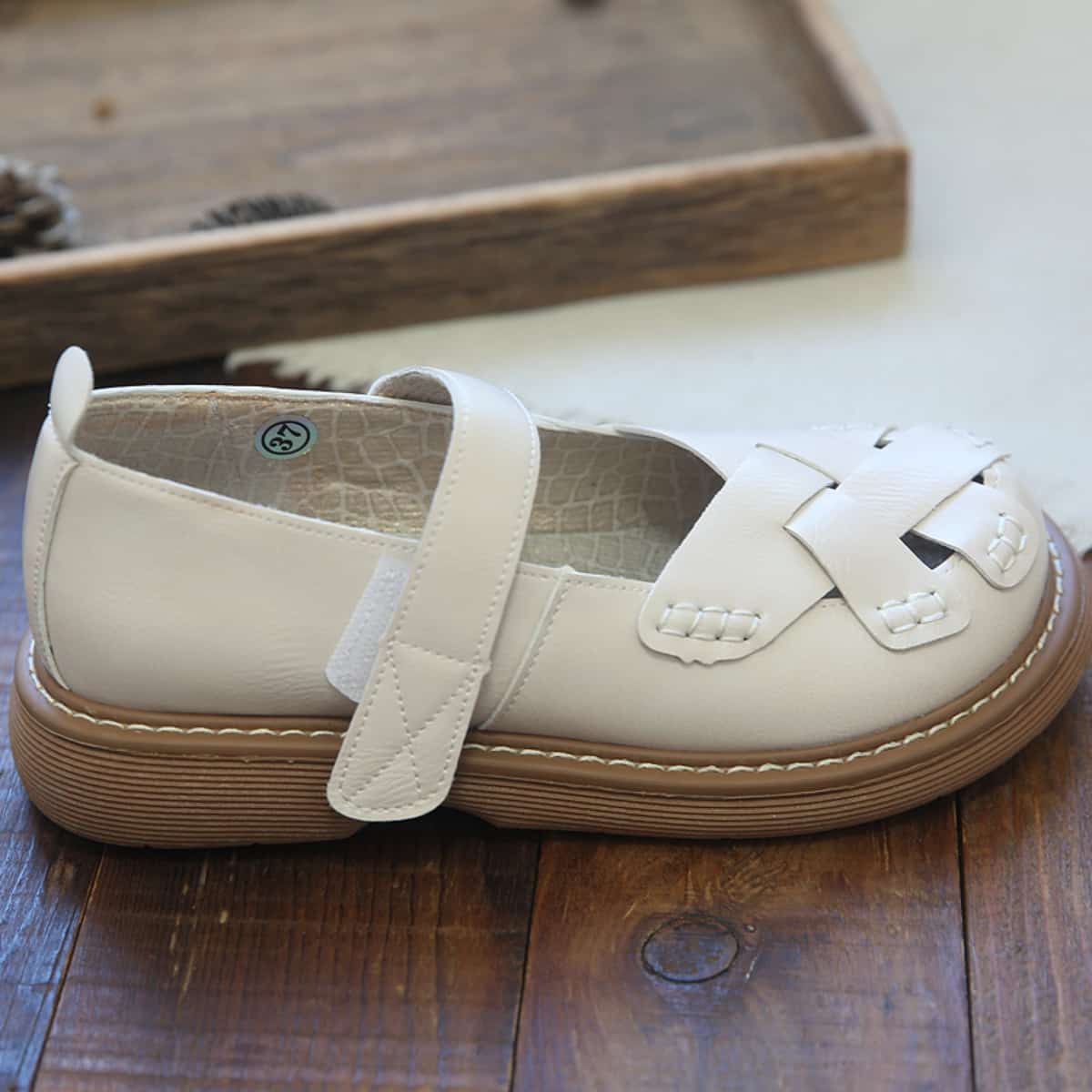 Hollow woven round head light mouth small leather shoes summer word with thick sole comfortable beige sandals