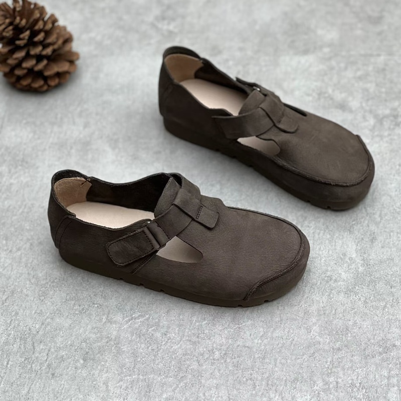 Side view of the vintage Japanese leather flats showing the soft sole construction and rounded toe shape